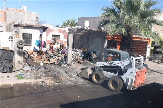 Retiran 21 toneladas de basura en vivienda